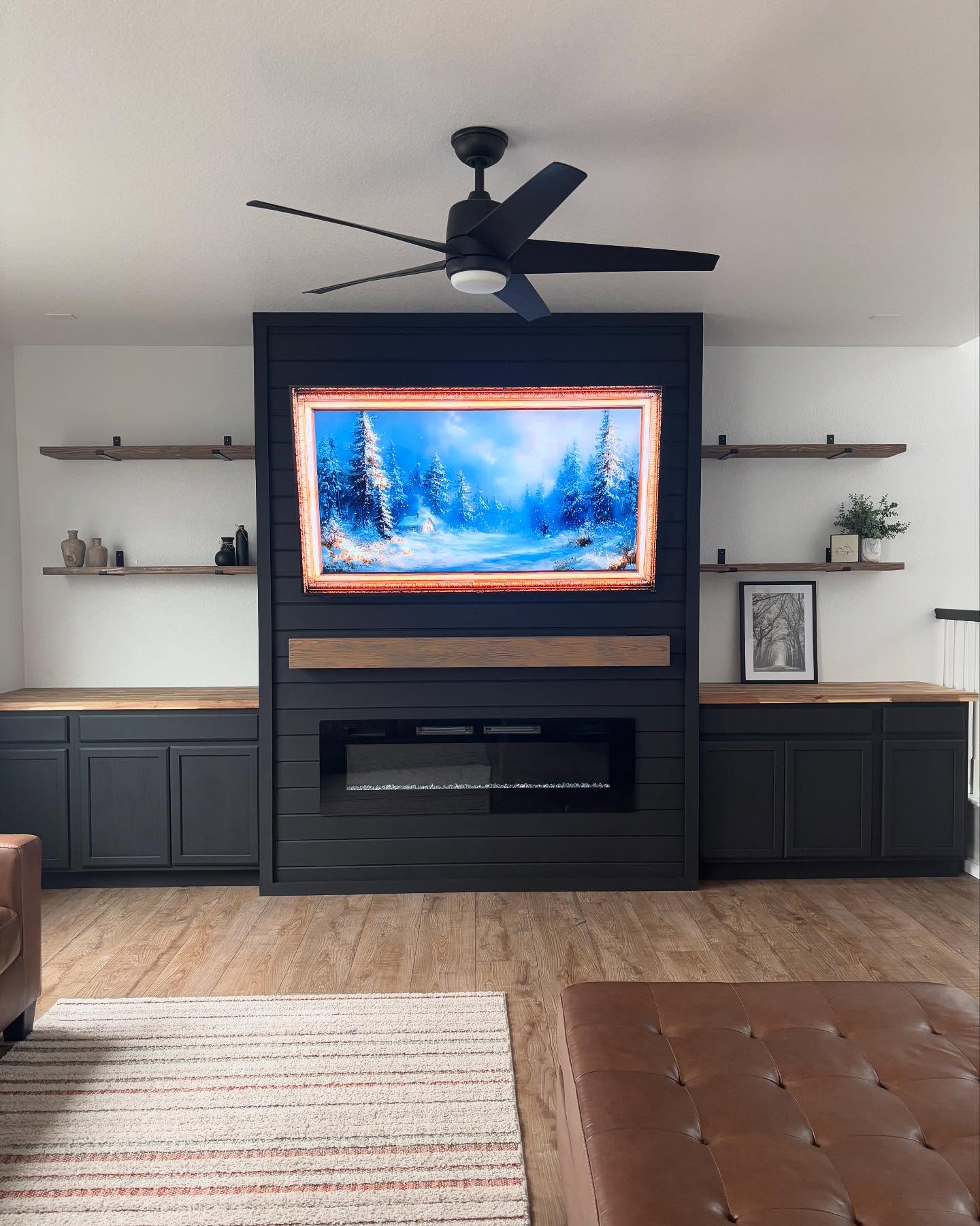 Custom built-ins and fireplace wall by Mountain Ridge Renovations LLC
