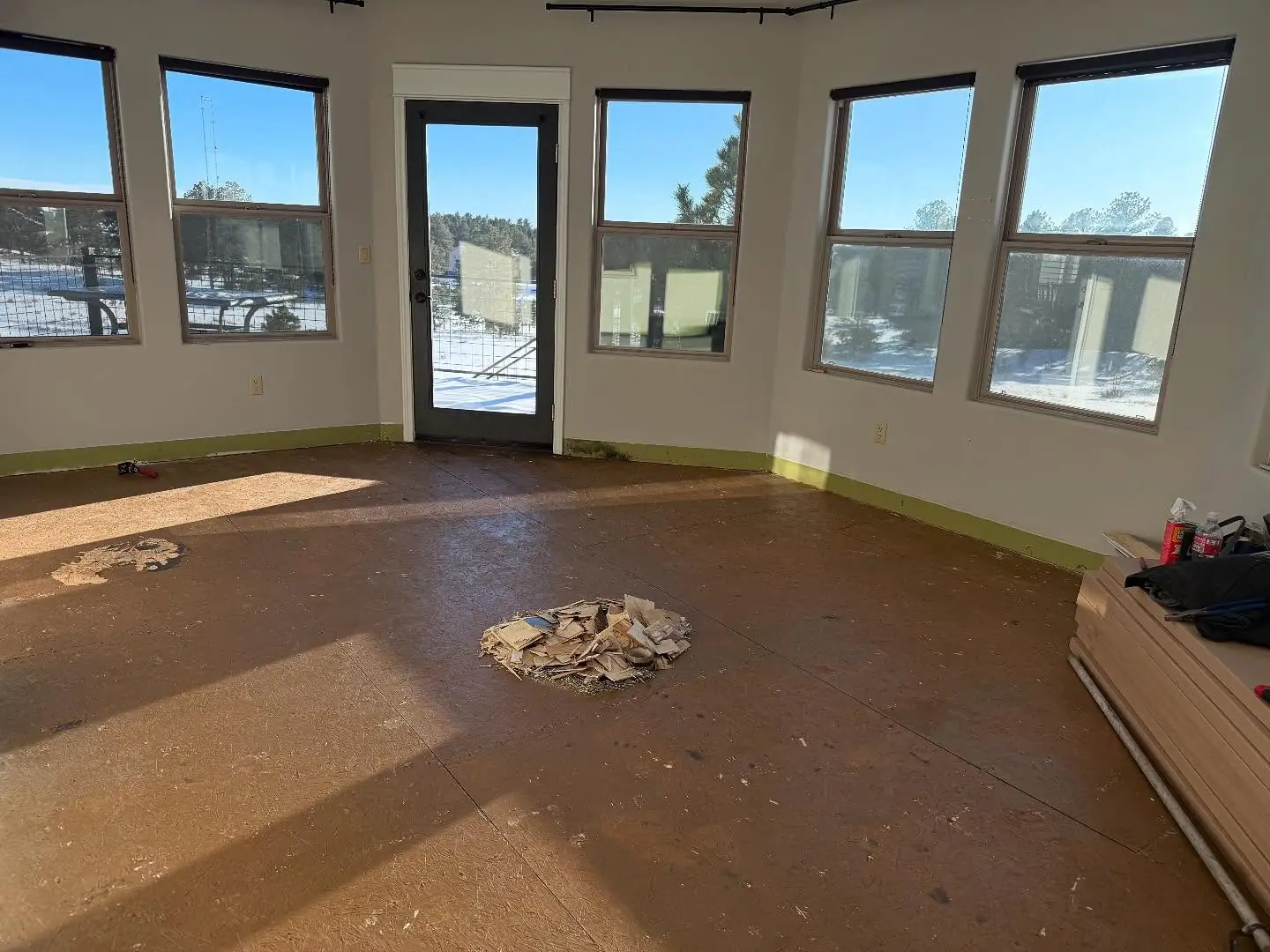 Floor upgrade. Removal of old flooring and new Luxury Vinyl Flooring – flooring installation by Mountain Ridge Renovations