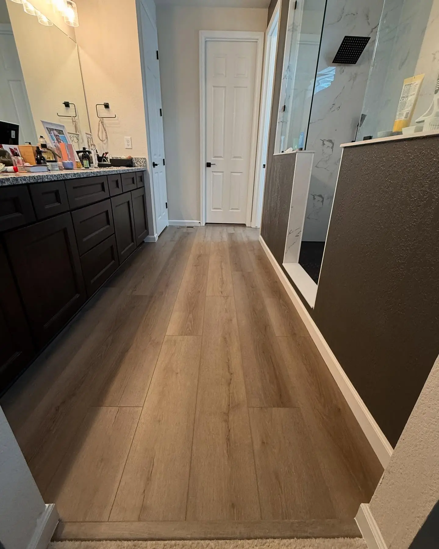 Flooring install and Accent wall – flooring installation by Mountain Ridge Renovations in Denver, Colorado