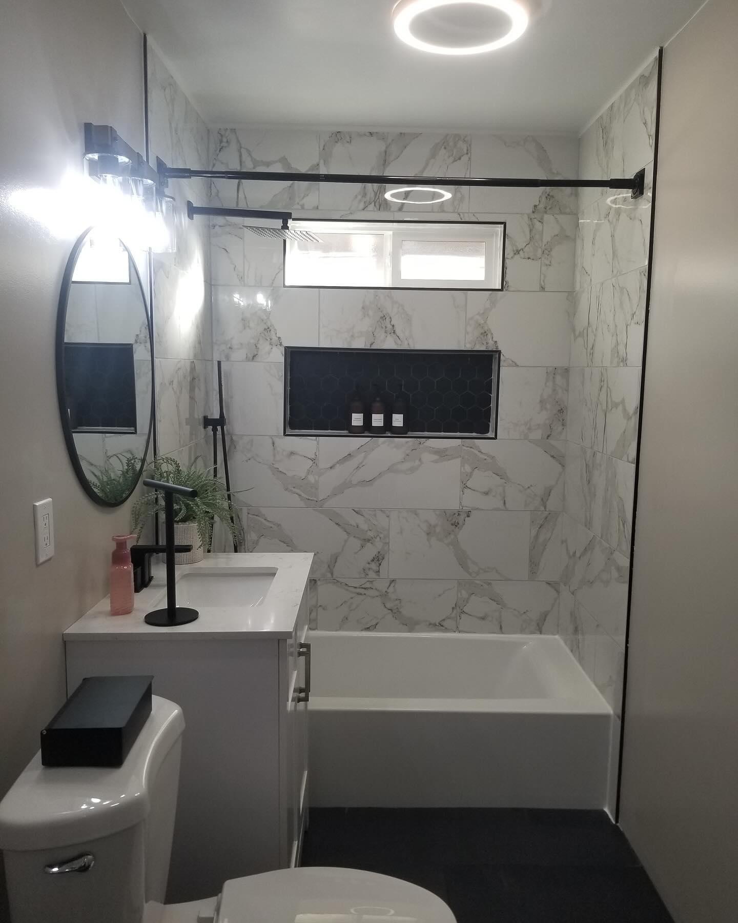Bathroom remodel with new tile and fixtures by Mountain Ridge Renovations