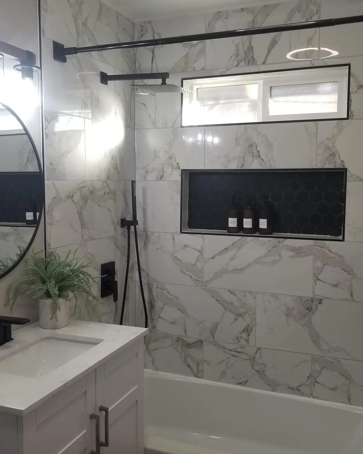 Full bathroom remodel. Updated all elements of the space, new tile – bathroom remodeling by Mountain Ridge Renovations