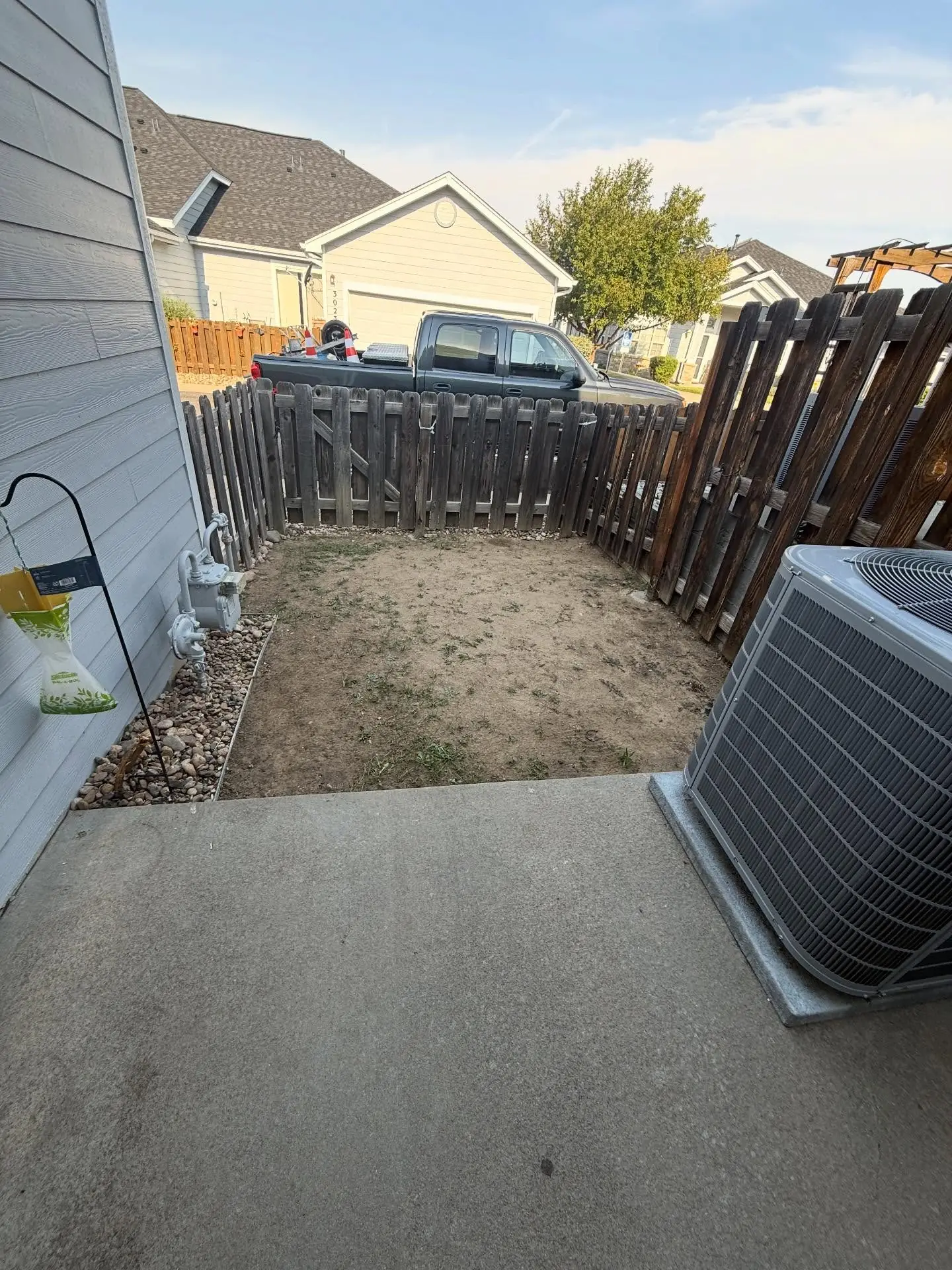 Stamped concrete and fence upgrade – concrete construction by Mountain Ridge Renovations in Denver, Colorado
